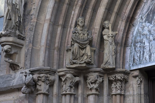 Figures on the portal of the Last Judgement around 1310