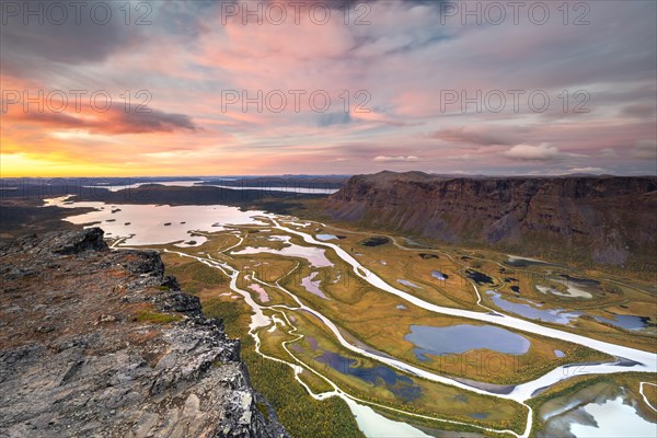 View from Skierffe mountain over the autumnal Rapadalen river delta