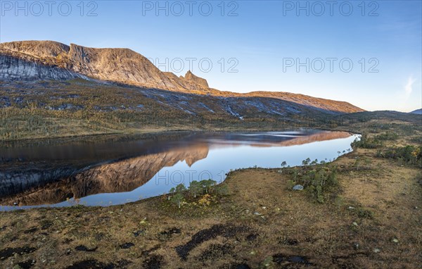 Mount Kulhornet reflected in small pond