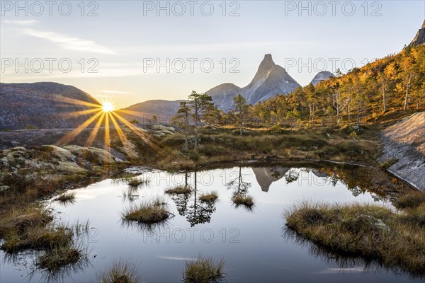 Stetind reflected in small pond