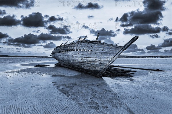 Wooden Shipwreck Bad Eddies Boat at Low Tide