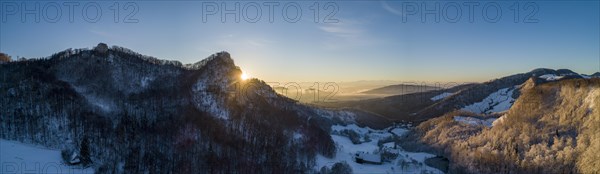 Sunrise at the Frohburg castle ruins and Geissflue summit cross