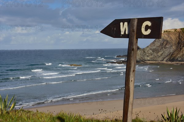 WC sign at Amoreira beach