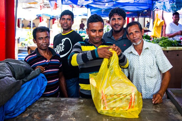 Egg seller in the market hall