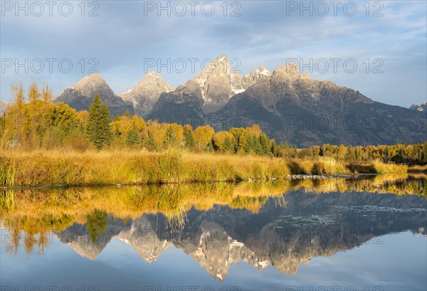 Autumn landscape with Grand Teton Range mountains