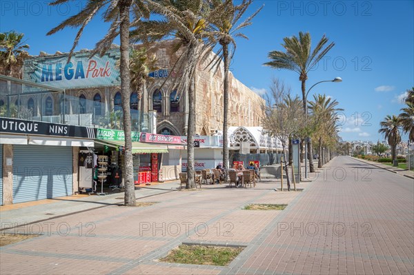 Deserted beach promenade and closed gastronomy megapark at Ballermann during Lockdown