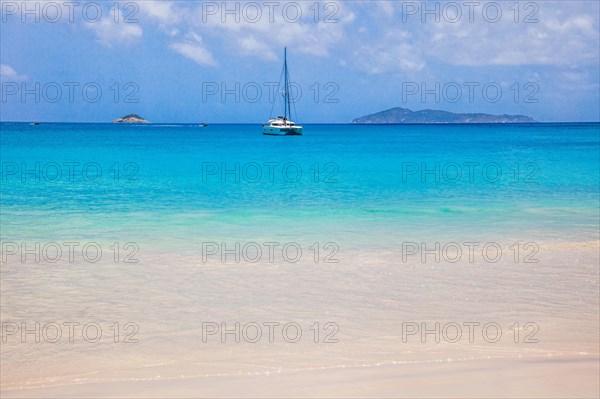 Dream beach with sailboat