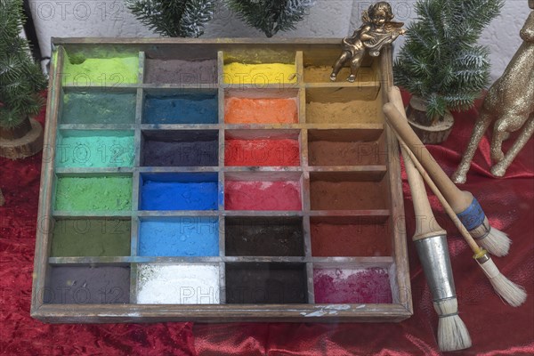 Old wooden box with powder paints