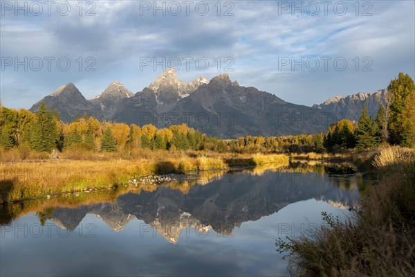 Autumn landscape with Grand Teton Range mountains