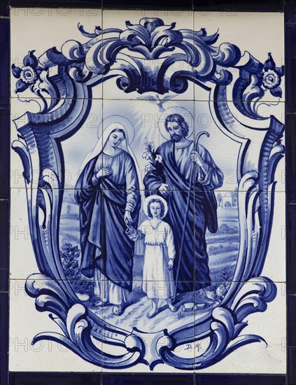 Typical Portuguese tile painting with saint motifs at the house entrances