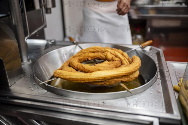 Traditional Iberian tasty sweets called fartura ready to sell at Santa Iria festival in Faro