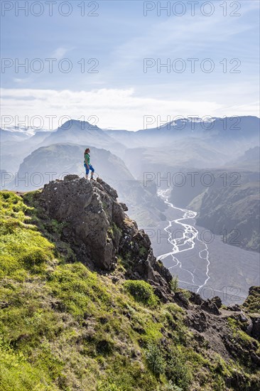 Hiker looking over landscape