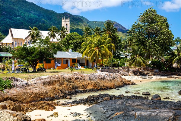 Beau Vallon beach with village church