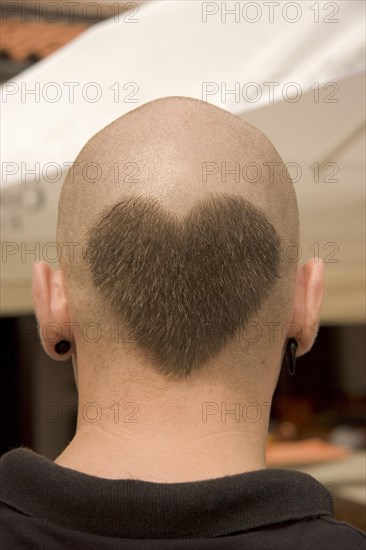 Head from behind with hairdo in heart shape