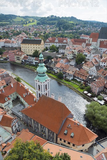 Town view from the castle tower with St.-Jost church and Vltava river