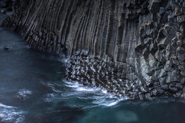 Basalt rock in the sea