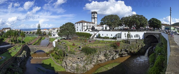 City park with town hall and bell tower