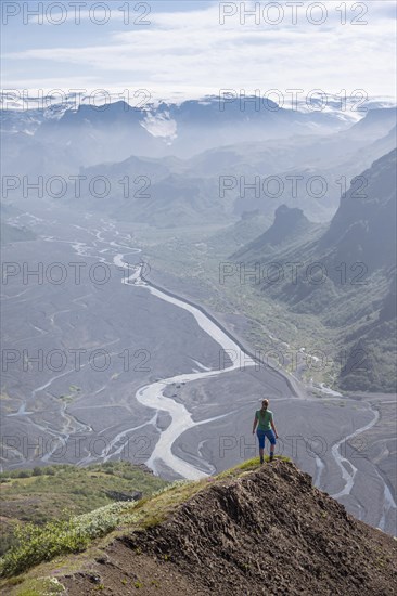 Hiker looking over landscape