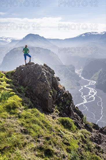 Hiker looking over landscape