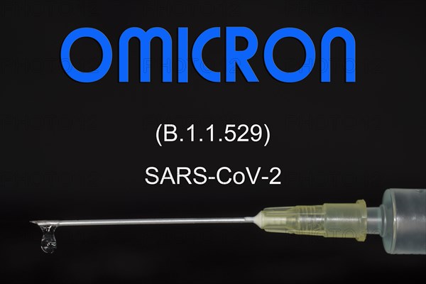 Injection syringe with the vaccine against the Omicron virus