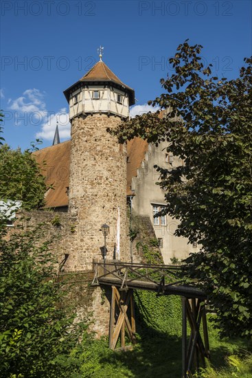 City wall with thief tower and castle