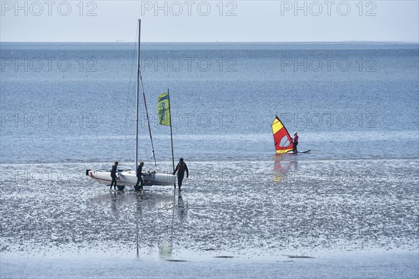 People on the edge of the Wadden Sea