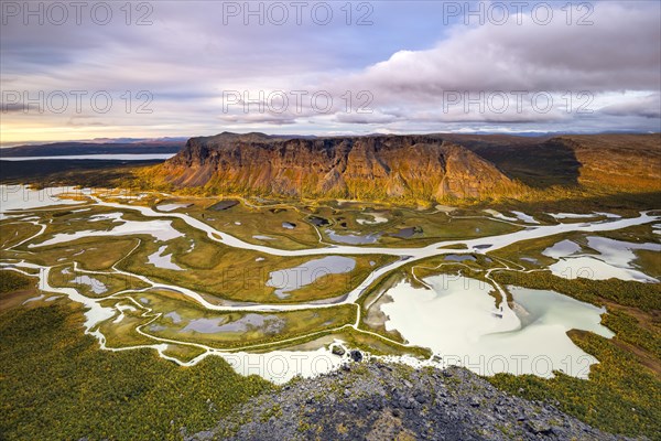 View from Skierffe mountain over the autumnal Rapadalen river delta