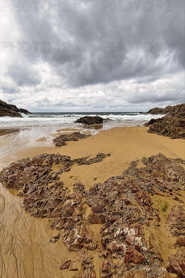 Rocks on the sandy beach