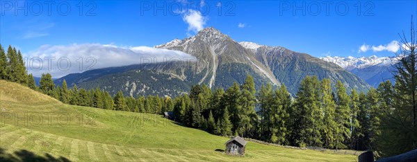 Fog band and prominent debris flow channel at Klopaierspitze