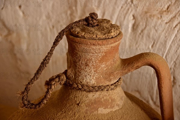 Clay water jug and cork stopper