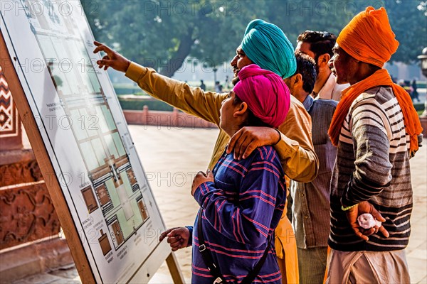 Sikhs at the red sandstone entrance gate