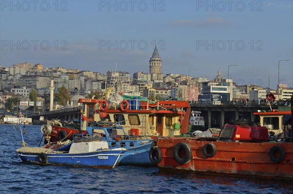 Ships at the Golden Horn with a view of the Galataturm in the Karakoey district