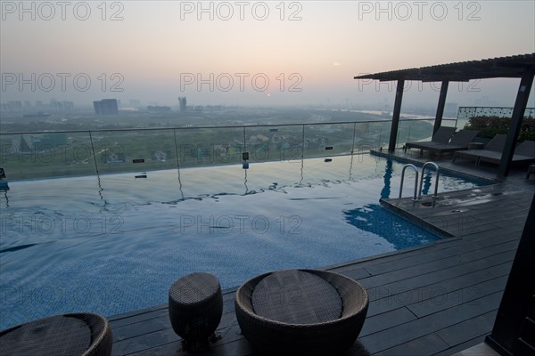 Dawn sunrise with pool on hotel roof