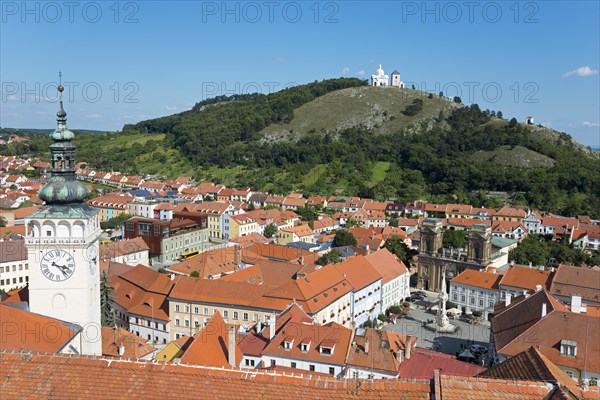 View from the border tower of the chateau to the old town with St. Wenceslas Church and view to the Holy Mountain Svaty kopecek