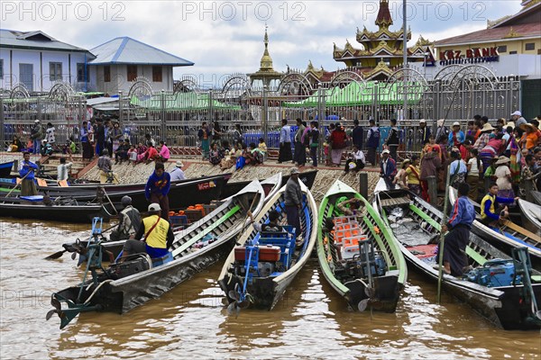 Boats in the main channel of Intha Pile Village Inn Paw Khon