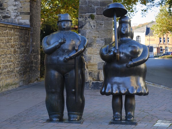 Man and woman with umbrella