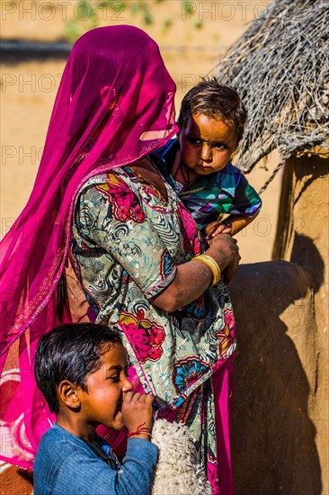 Colourfully dressed desert dwellers