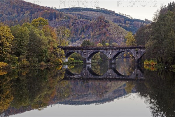 The river Lenne with a bridge in autumn