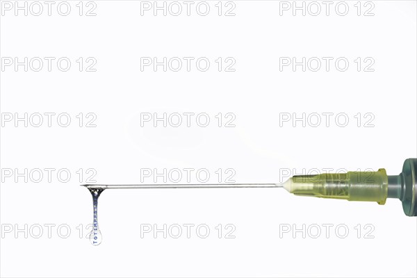 Hypodermic needle filled with inactivated vaccine