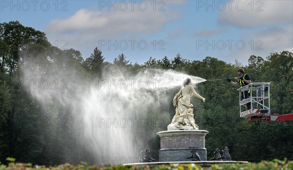 Cleaning with a steam water jet at the Fortuna Fountain of the New Herrenchiemsee Castle