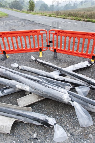 Asbestos material dumped illegally in a roadside laybye