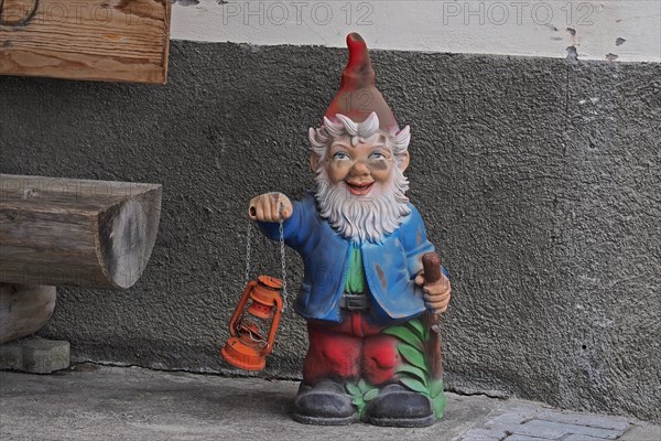 Garden gnome with paraffin lamp