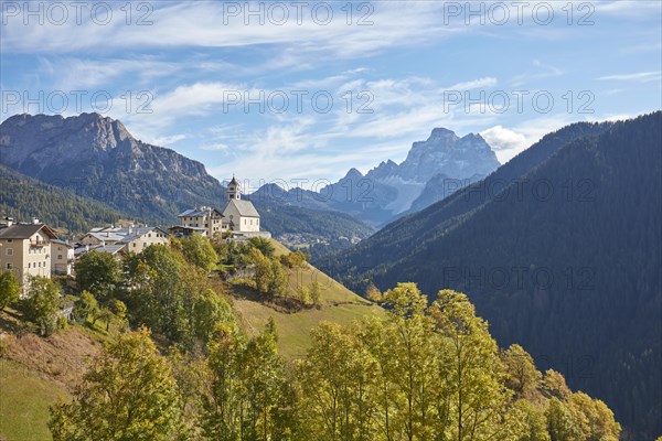 View of the church Chiesa di Colle Santa Lucia in Santa Lucia in autumn