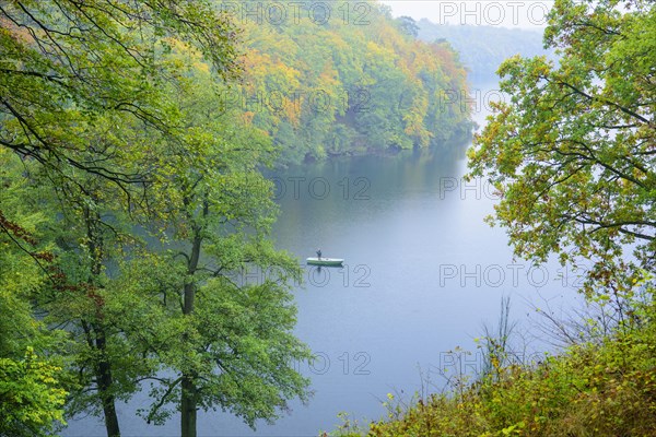 Narrow Luzin in autumn with angler