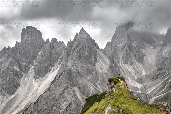 Hiker standing on a ridge