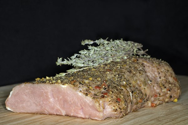 Seasoned raw saddle of veal