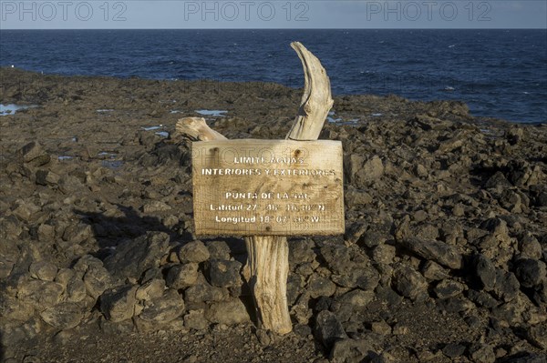 Sign at cliff