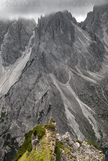 Hiker standing on a ridge