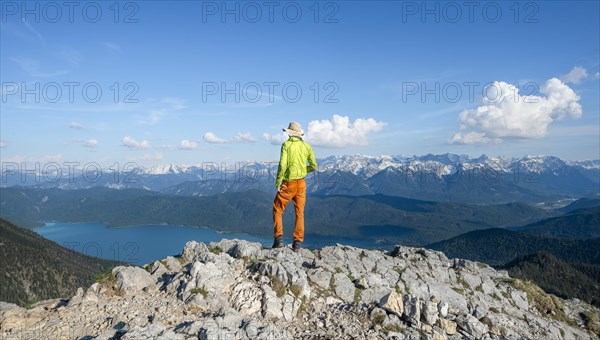 Hiker at the summit of Heimgarten