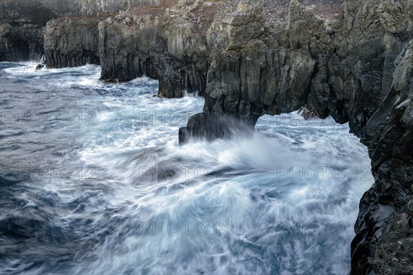 Rock arch juts into the Atlantic